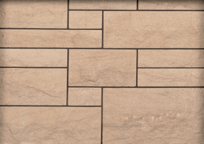 Fletcher Bank sandstone Rock Faced ashlar sample panel by Cumbrian Stone