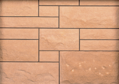 Lazonby sandstone Rock Faced ashlar sample panel by Cumbrian Stone
