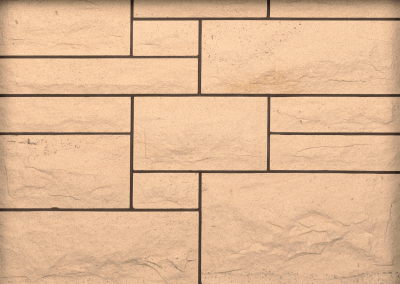 Scotch Buff sandstone Rock Faced ashlar sample panel by Cumbrian Stone